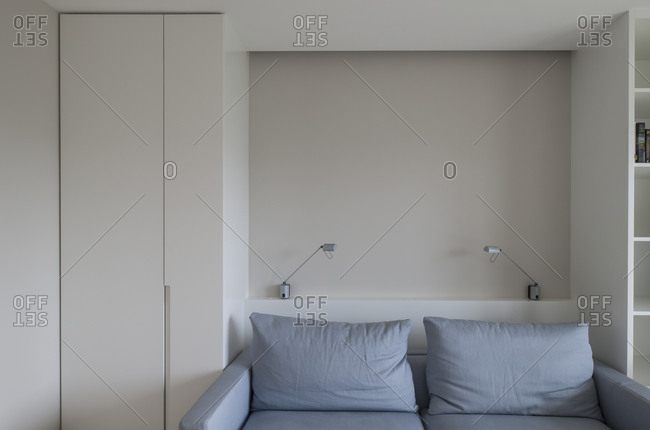 Loveseat against a wall in home