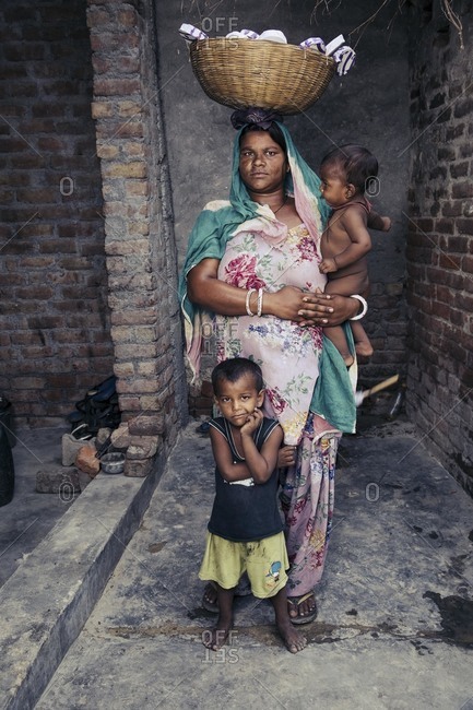 Delhi, India - June 19, 2015: Portrait of Indian woman and children