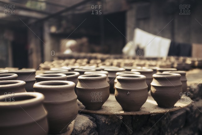 Ceramic pots drying in India
