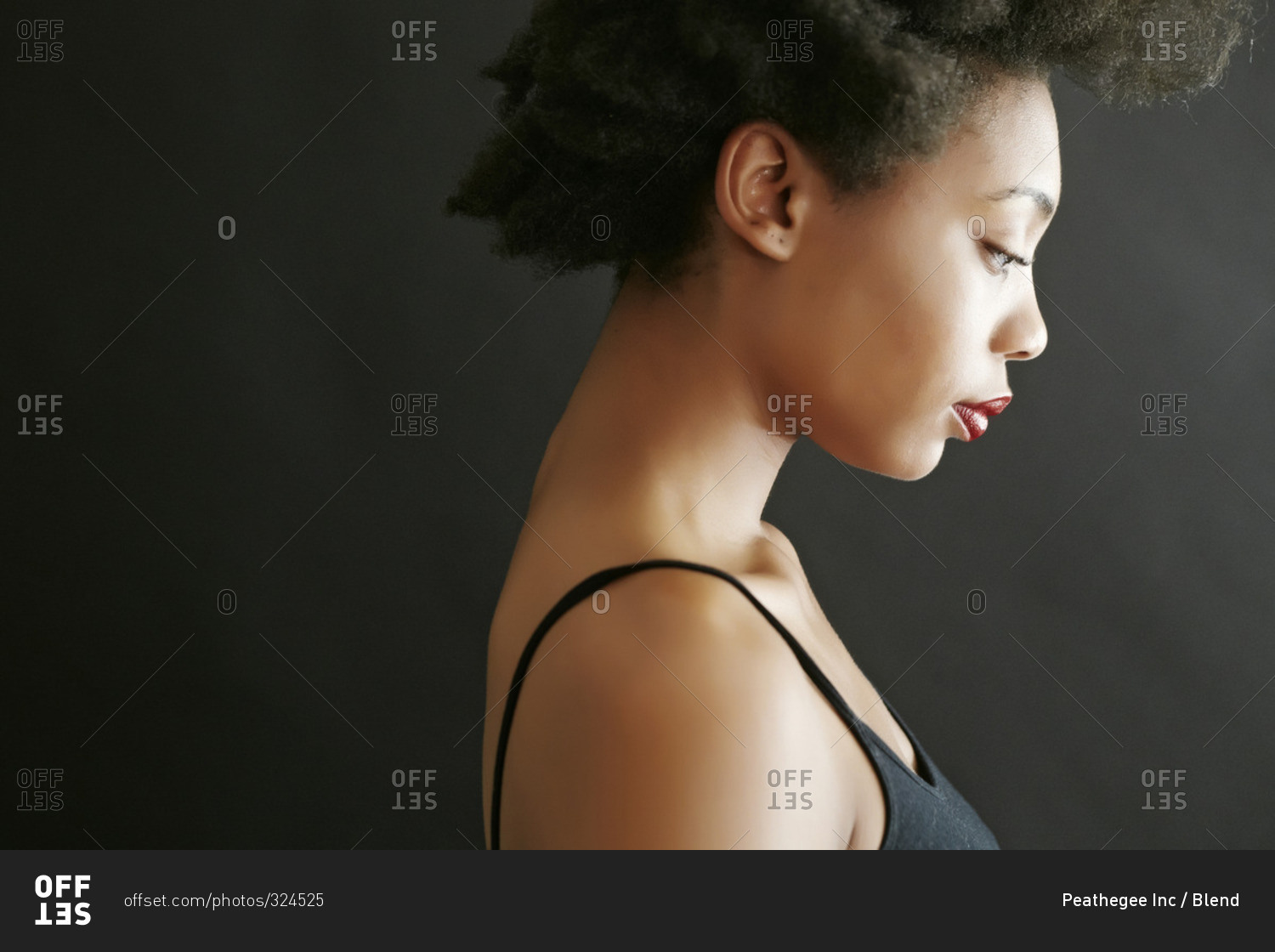 Close Up Profile Of Woman Looking Down Stock Photo OFFSET