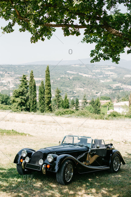 Provence, France - July 4, 2015: Pristine classic car parked in the country