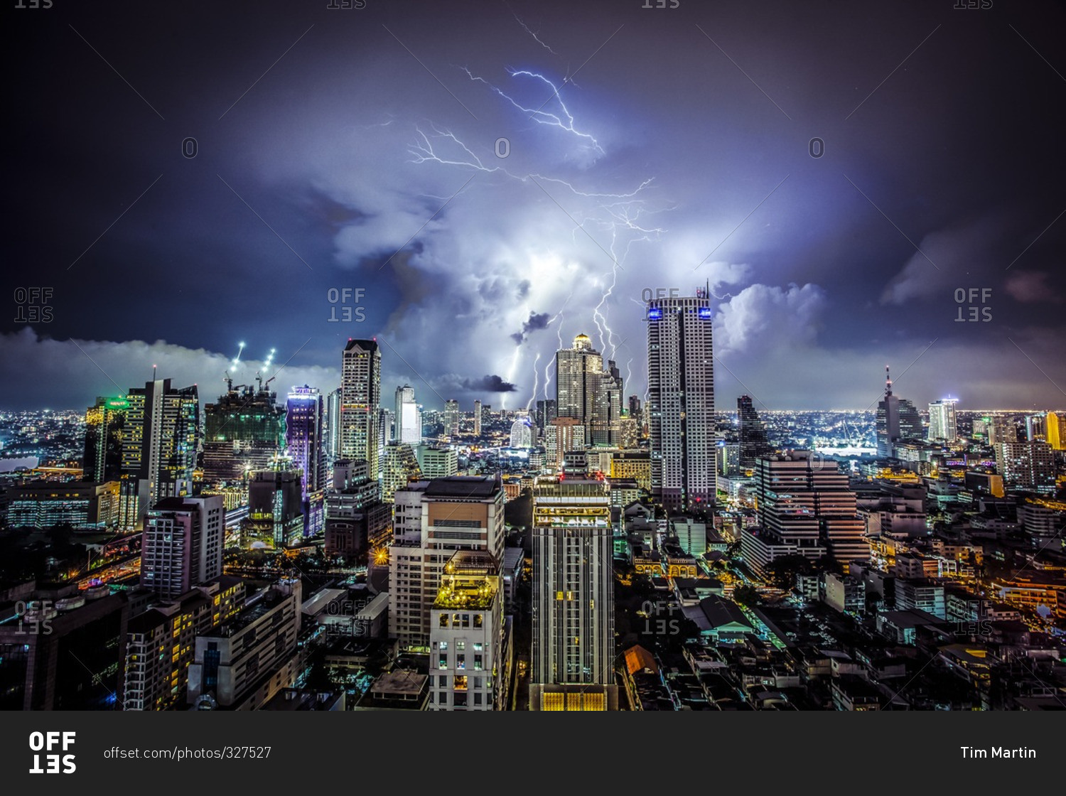 Lightning striking above the Bangkok skyline stock photo OFFSET
