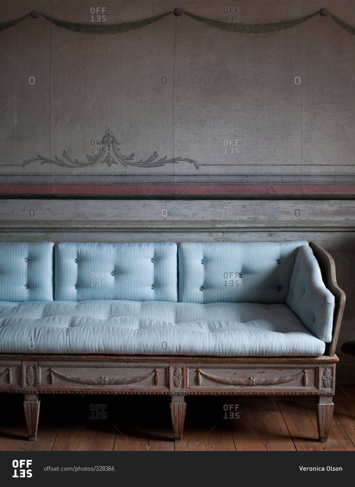 An antique sofa in a room