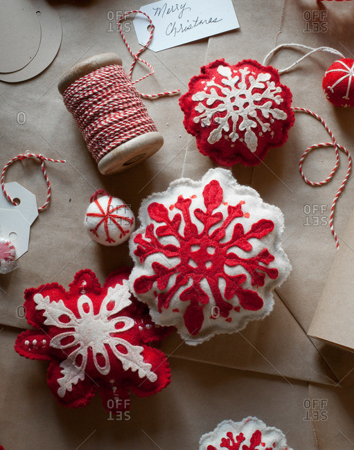 Stuffed snowflake ornaments and thread