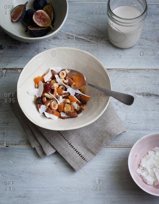 A bowl of granola by figs