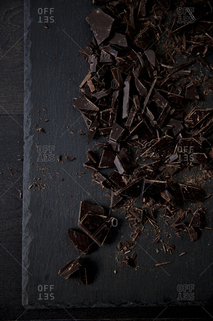 Chunks of baking chocolate on a cutting board