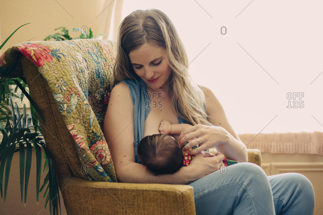 breastfeeding chair stock photos - OFFSET
