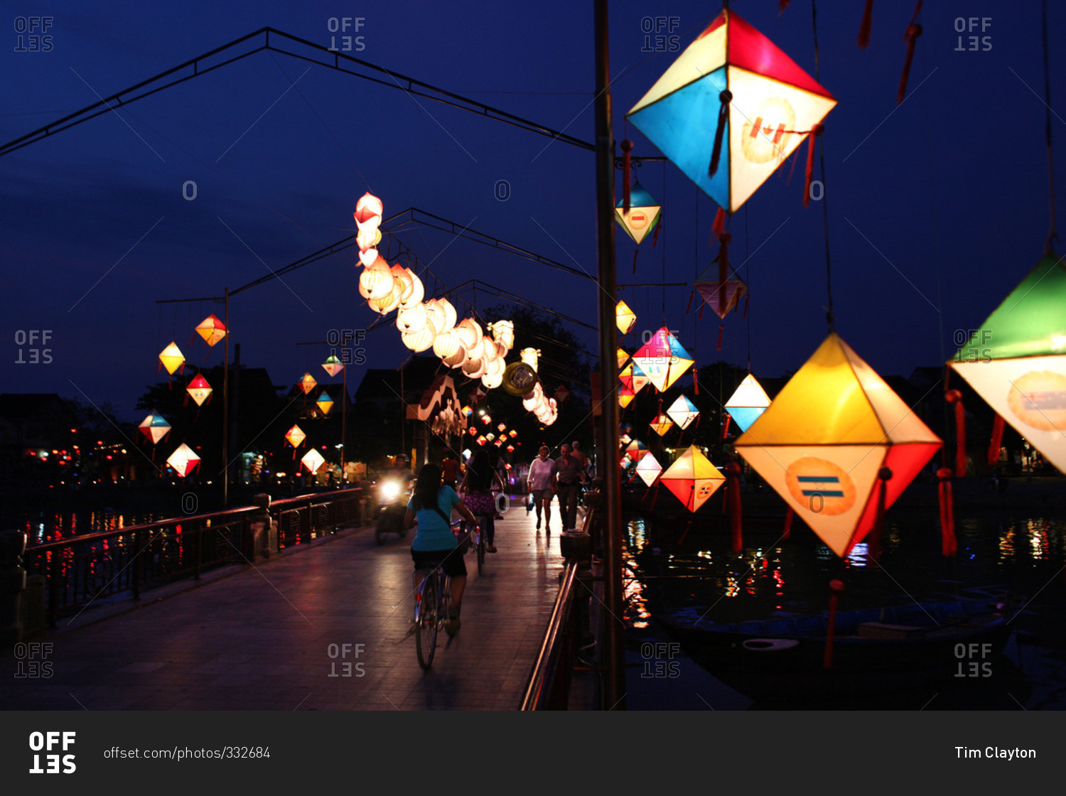 The lantern lit bridge at night time in Hoi An, Vietnam
