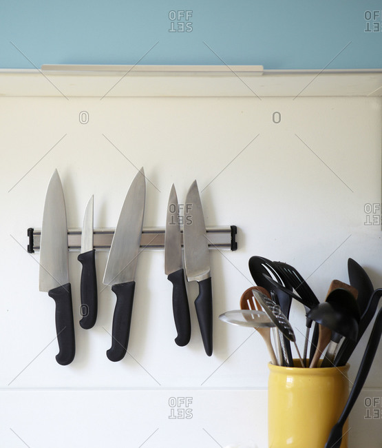 Kitchen knives hanging on the wall