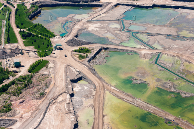 Aerial view of roads and ponds in a quarry