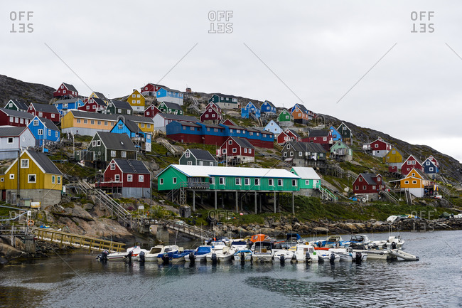 An arctic fishing community perched on a rugged, barren island
