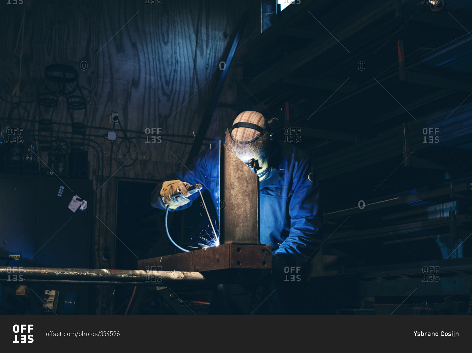 Man in welding mask at work
