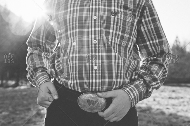 wearing a belt buckle