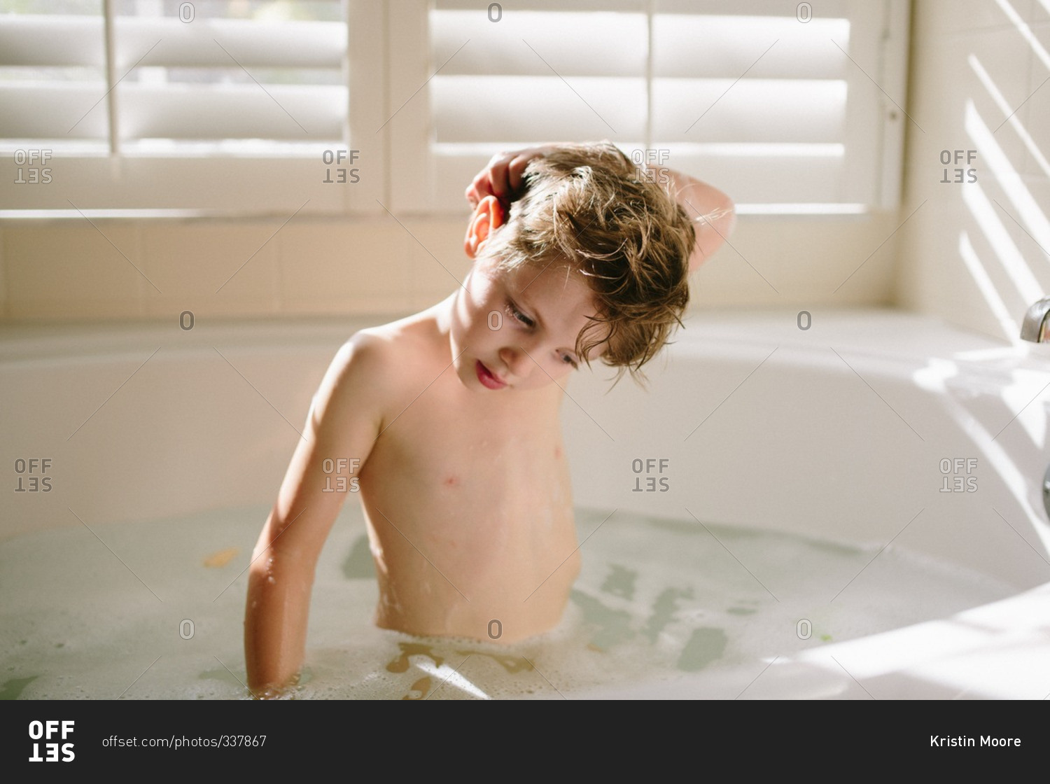 Boy Sitting Up In The Bathtub Stock Photo Offset