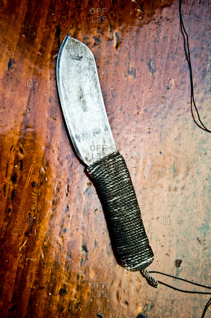 Rustic knife on wooden table