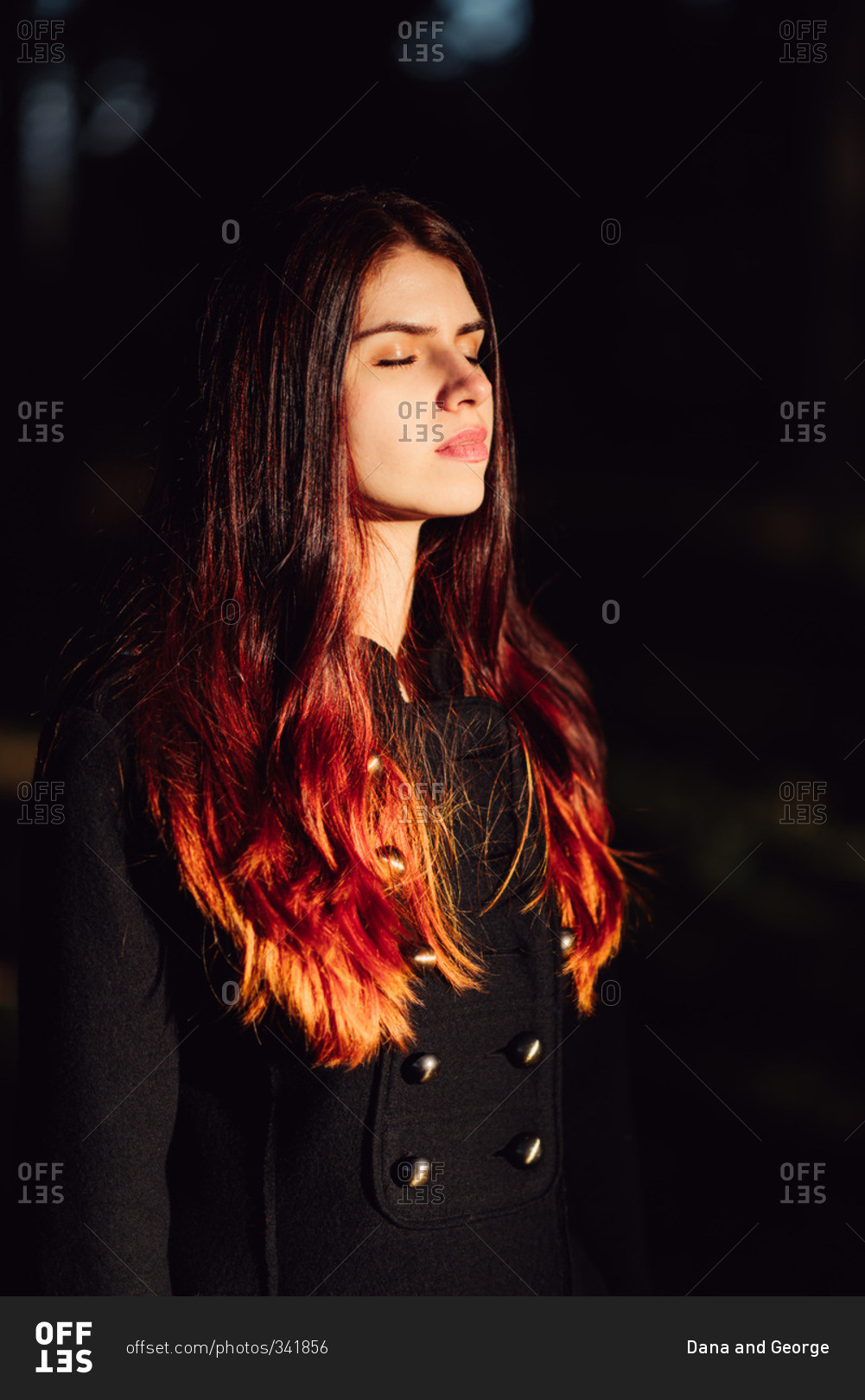 Woman with red hair soaking up the sun