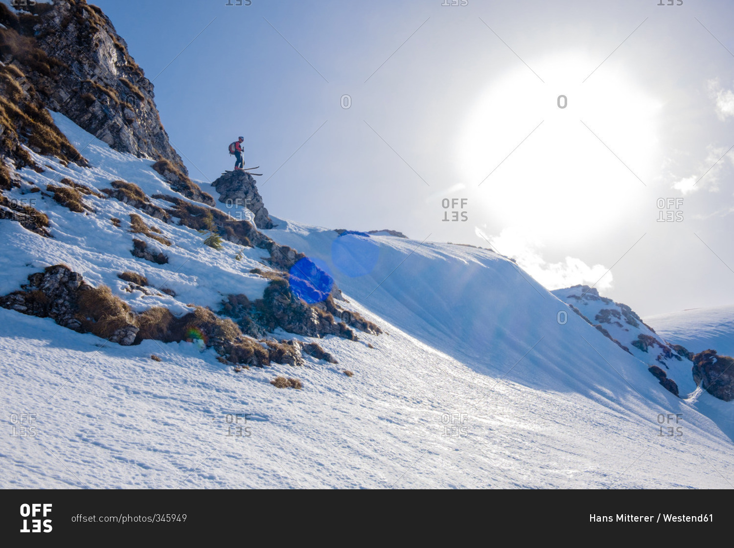 Romania, Southern Carpathians, skier in winter landscape