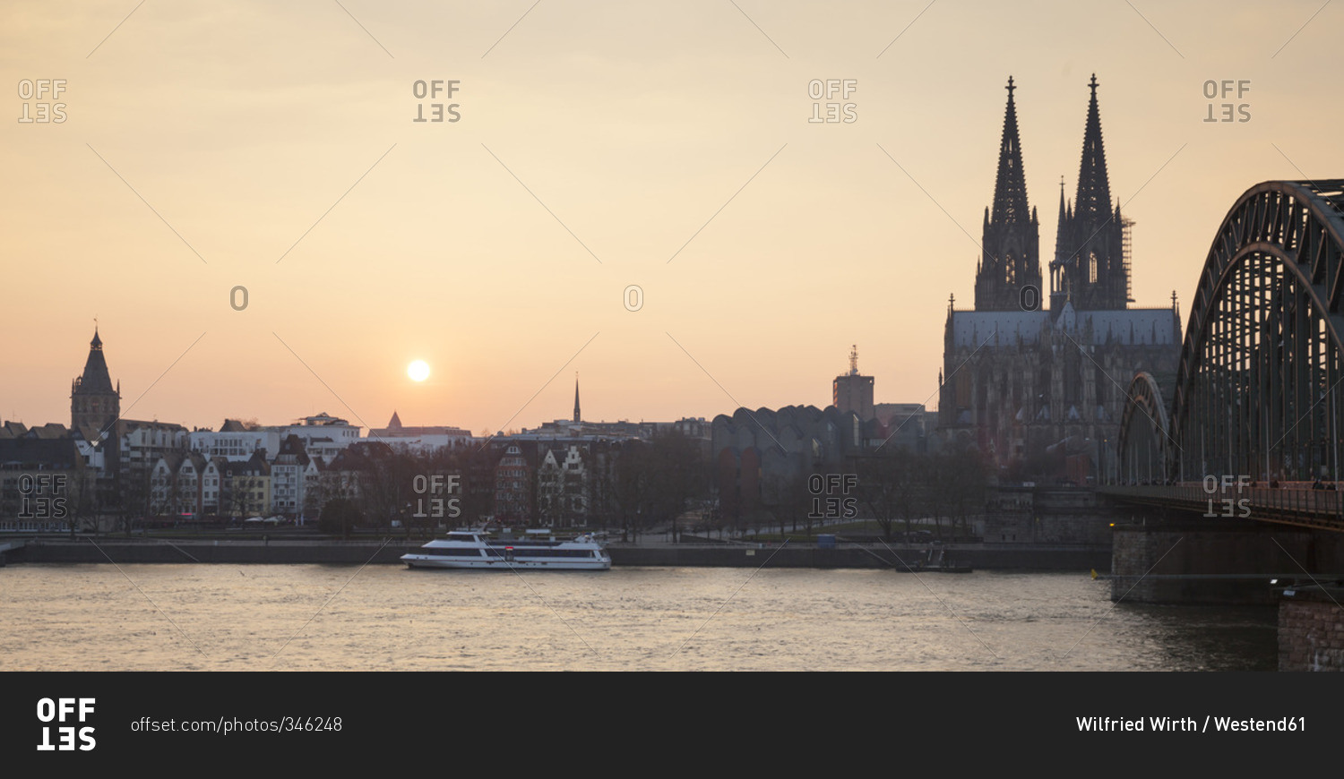 Germany, Cologne, view to the old town and Cologne Cathedral by sunset