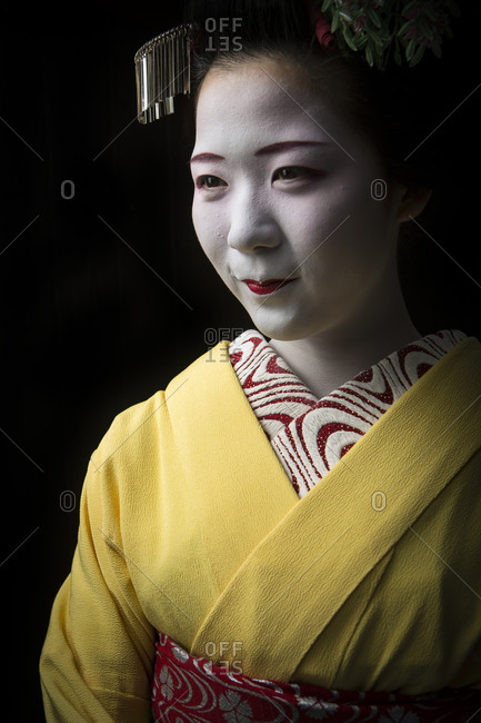 Japan - June 17, 2014: Portrait of a Geisha on a dark background