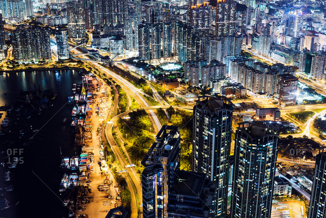 Aerial of Kowloon at night, with light trails, Hong Kong, China