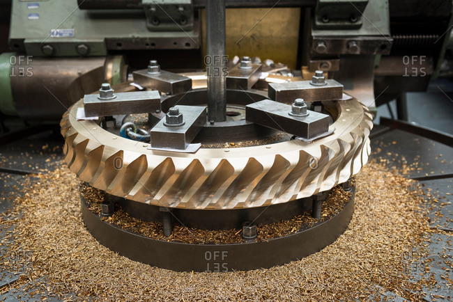 Bronze worm gear wheel in lathe in engineering factory