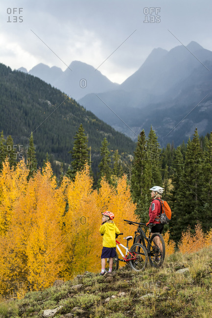 A mother and daughter mountain biking in the San Juan National Forest, Silverton, Colorado.