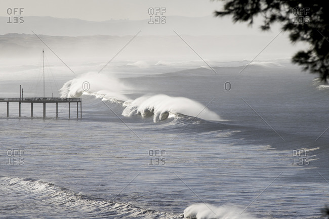 Large waves and a pier