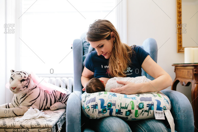 breastfeeding chair stock photos - OFFSET