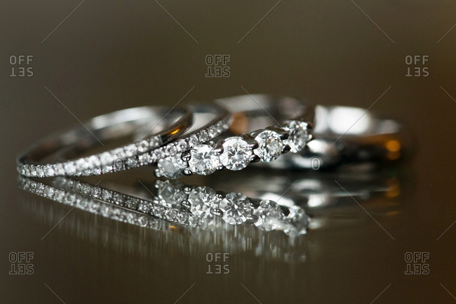 Close-up of a diamond ring and wedding ring