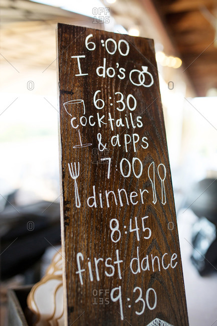 Wedding Reception Schedule Written On A Wooden Board Stock Photo