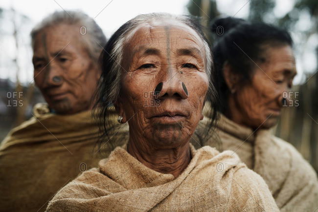 Arunachal pradesh, India - February 1, 2016: Portrait of a group of Apatani women with traditional bamboo discs in their noses