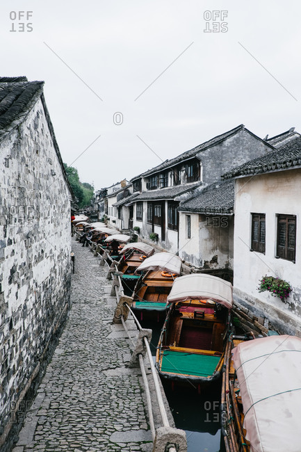 Boats on narrow canal in Zhouzhuang, China