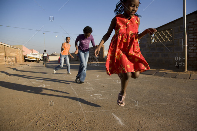playing hop scotch playing hop scotch