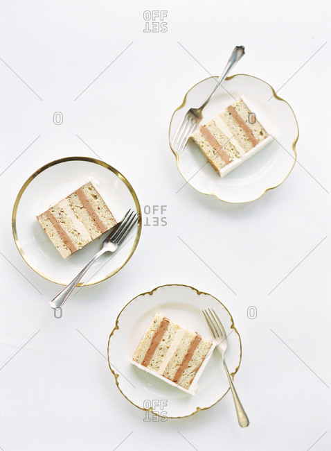 Wedding Cake Slice Stock Photos Offset Three Plates Of Wedding Cake With Layers Chocolate And Vanilla Ercream