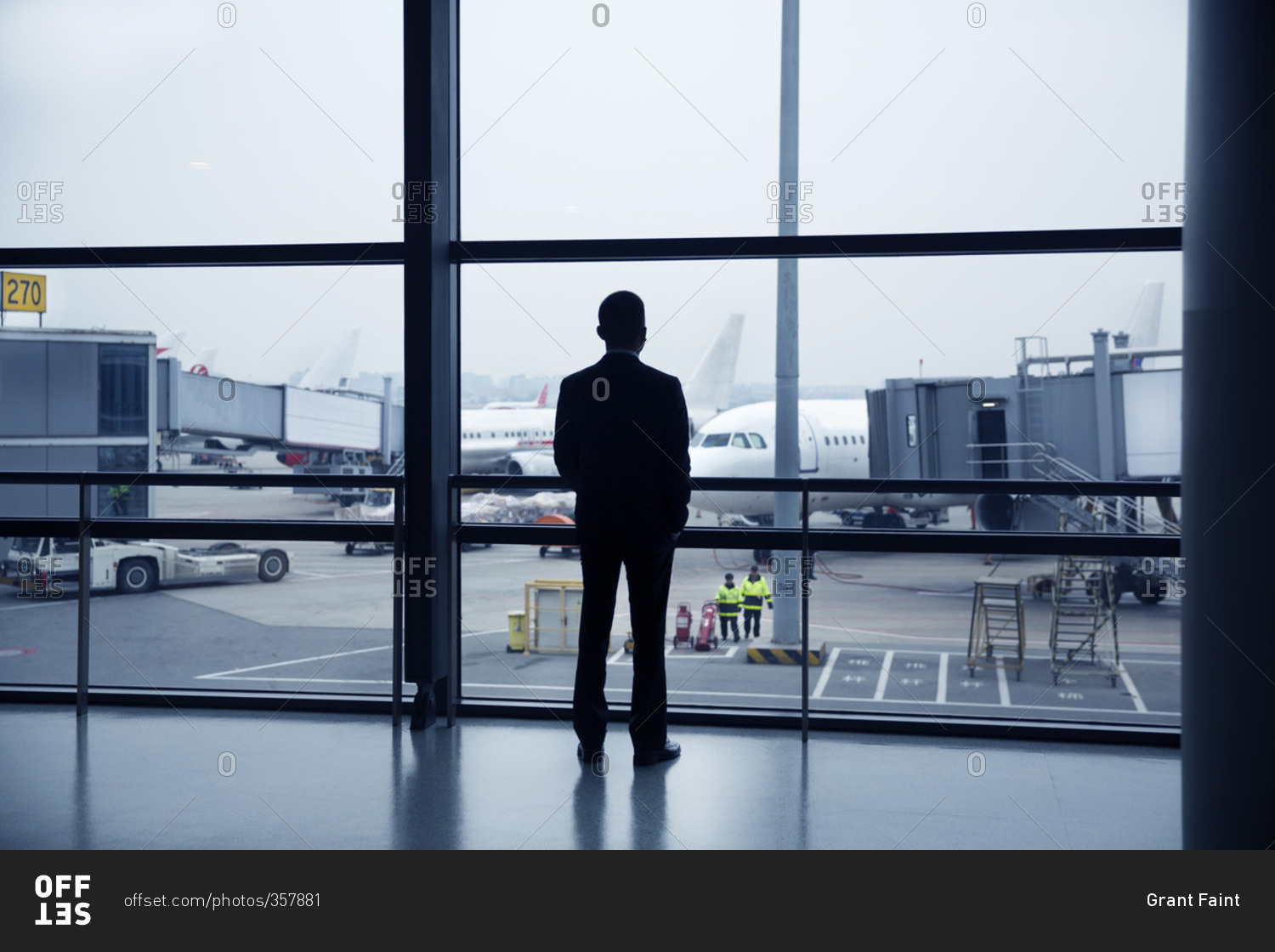 Businessman waiting for a flight at the Shanghai Pudong International Airport in Shanghai, China