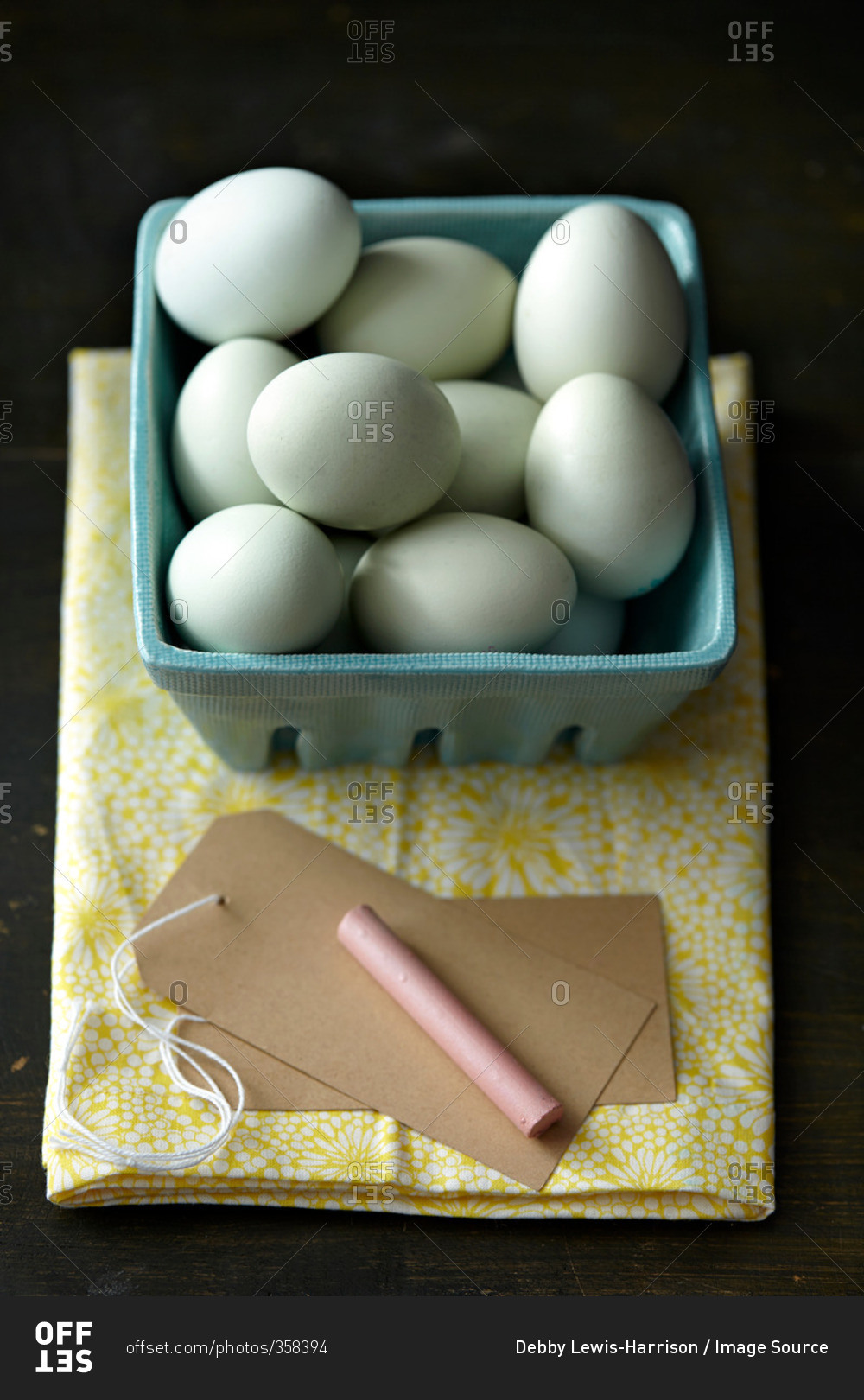 Chicken eggs, chalk, tag, kitchen towel