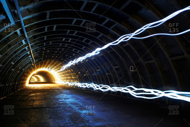Two light trails in tunnel