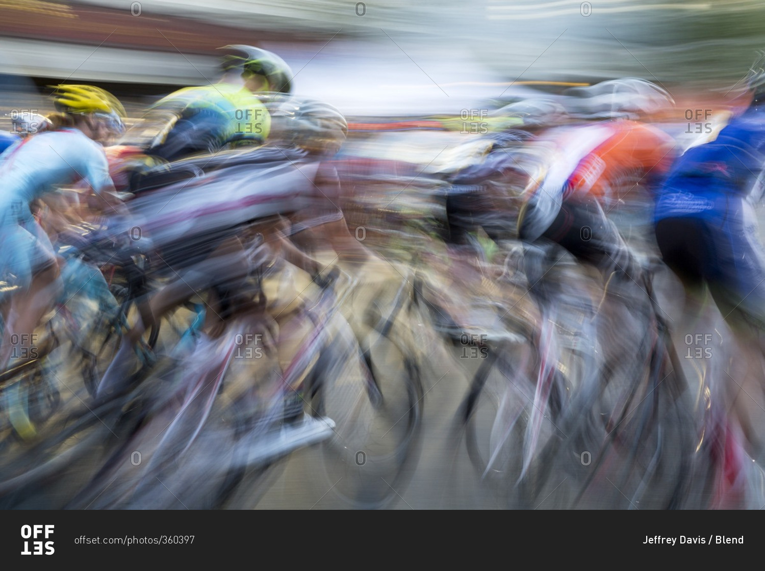 Blurred view of cyclists competing in race