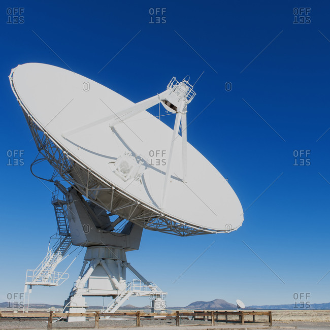 Satellite dish under blue sky