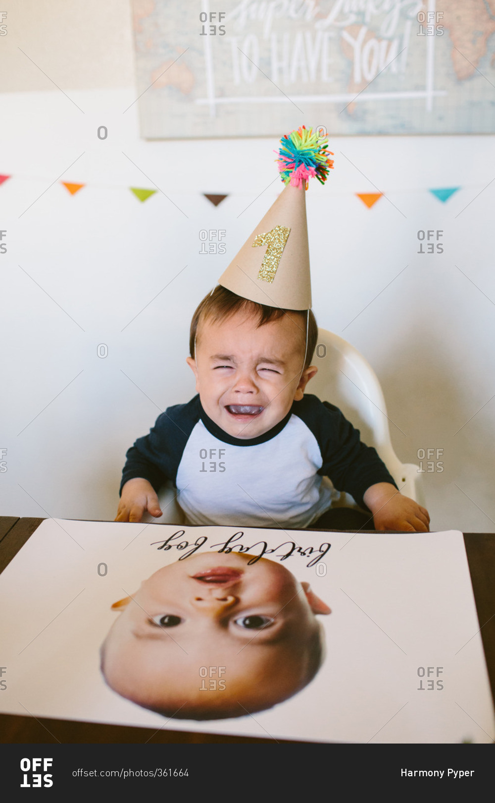 sad-baby-on-his-first-birthday-stock-photo-offset