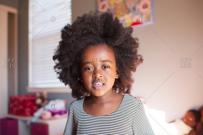 Portrait Of A Little Girl With Afro Hairstyle Stock Photo Offset