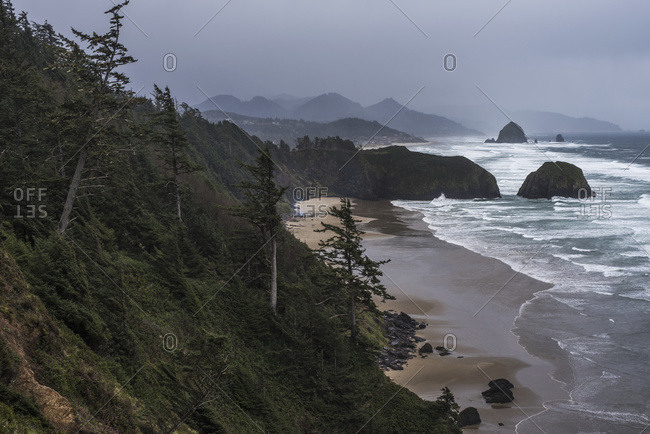 Rain creates a somber mood on the Oregon Coast; Cannon Beach, Oregon, United States of America