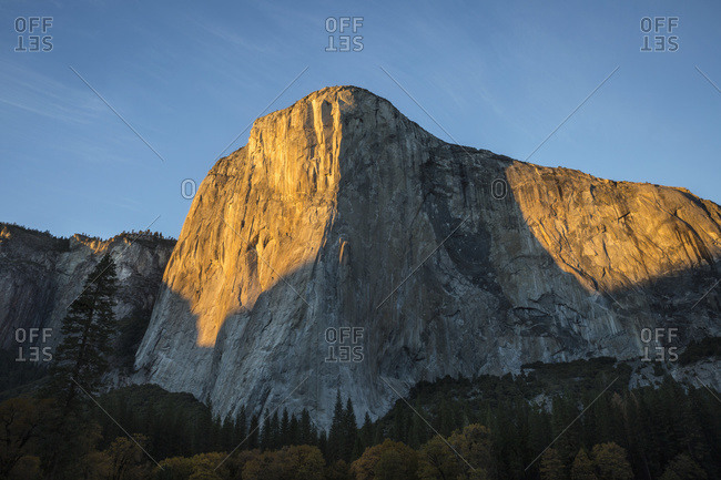 El Capitan (El Cap) bathed in late afternoon fall light in Yosemite Valley, Yosemite National Park; California, United States of America