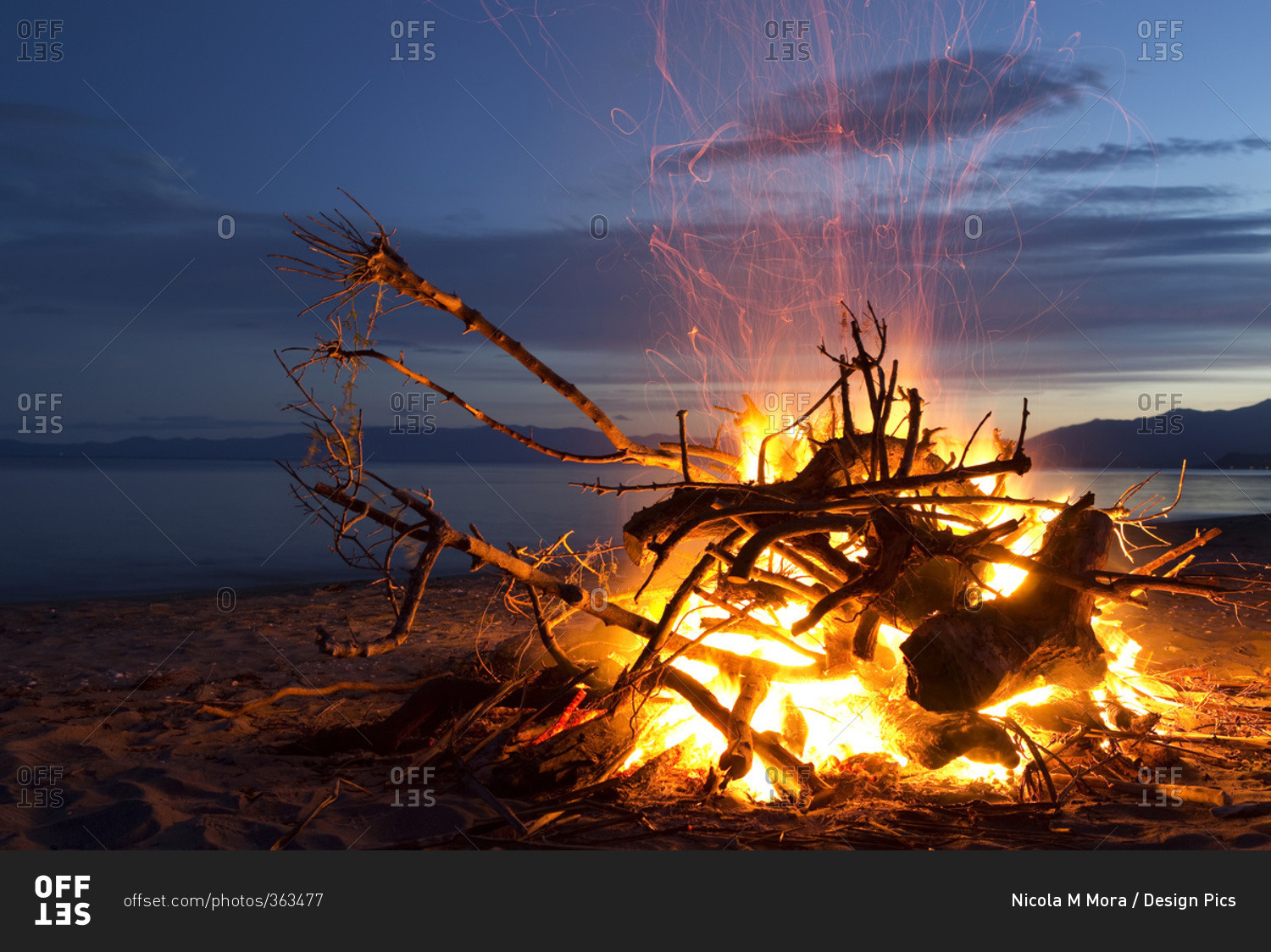 Bonfire on the beach at Golden Bay, New Years Eve; South Island, New Zealand