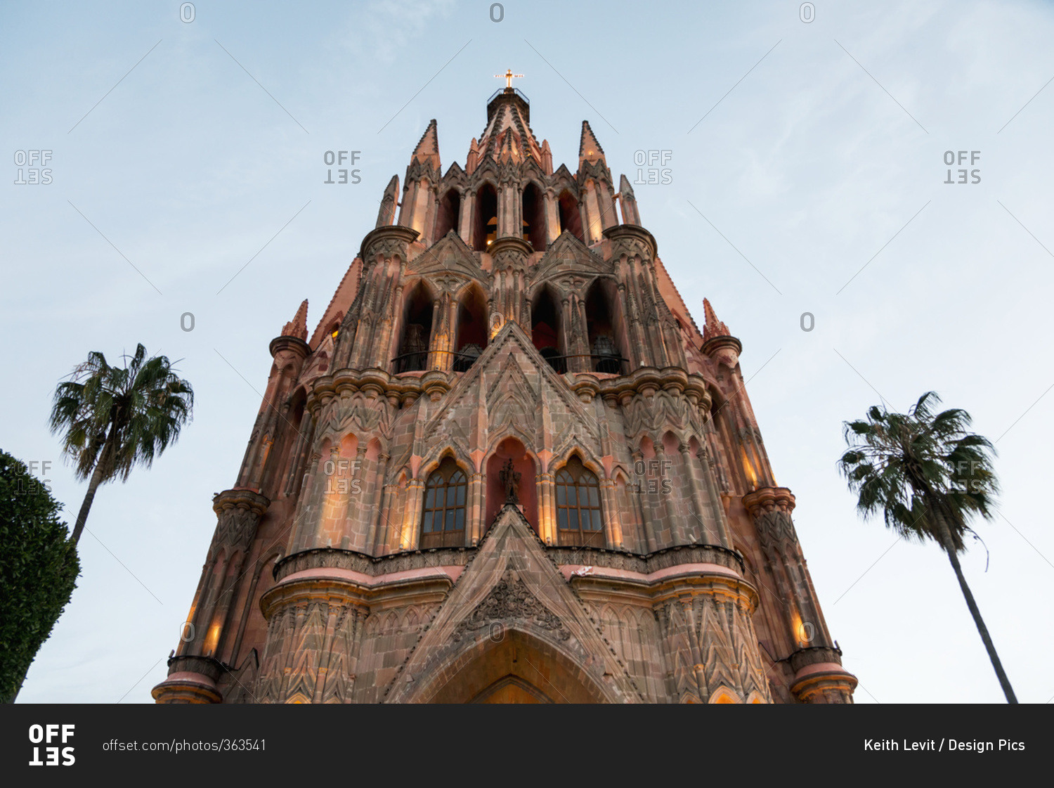 Church building with palm trees on either side; San Miguel de Allende, Guanajuato, Mexico