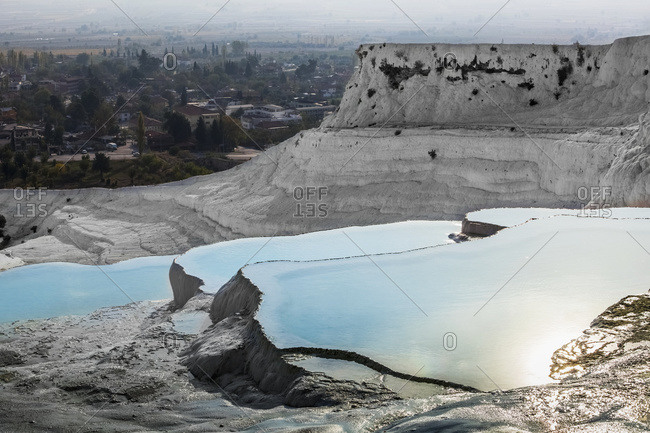 Hot springs and travertines, terraces of carbonate minerals left by the flowing water; Pamukkale, Turkey