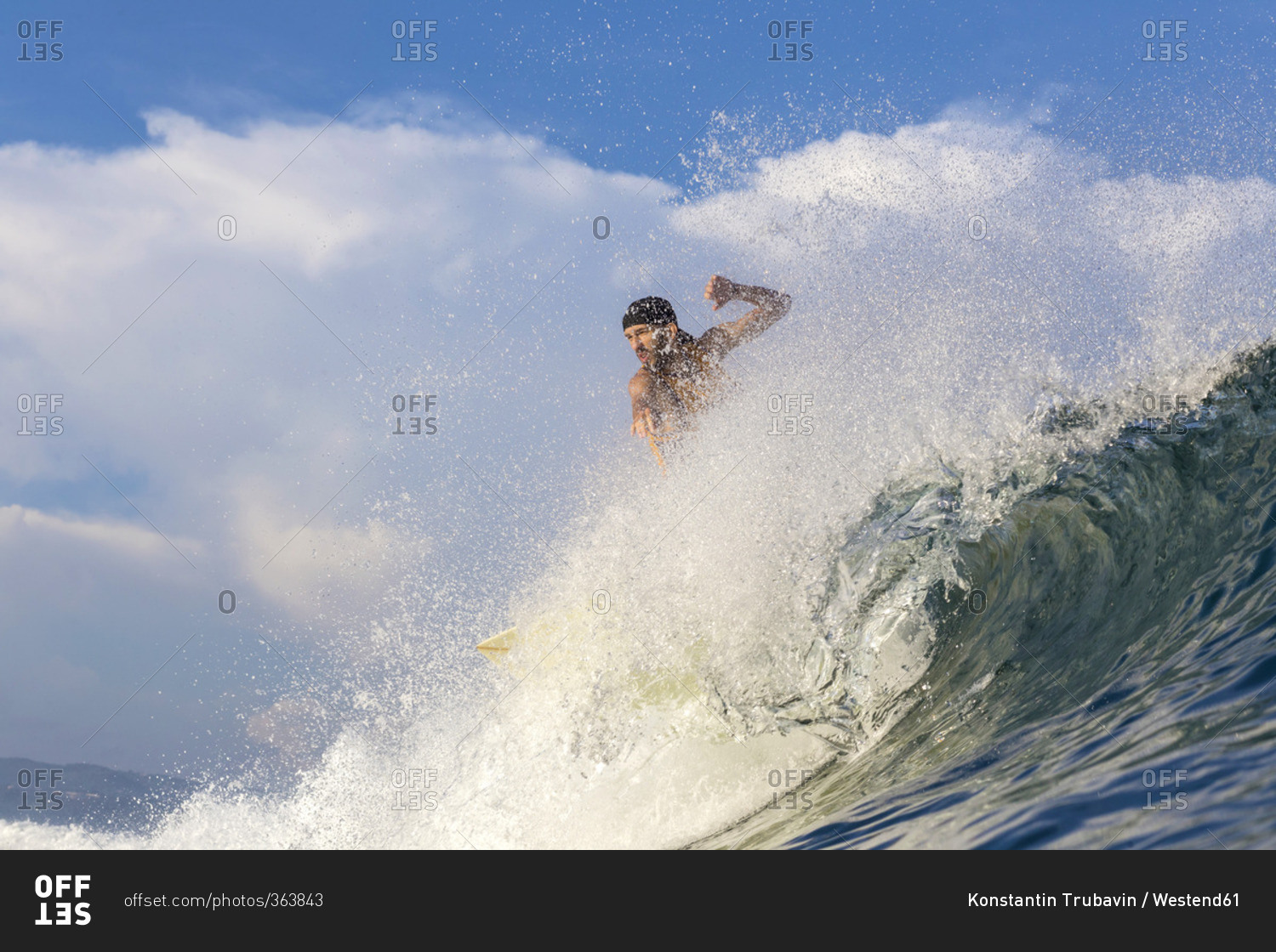 Surfing man