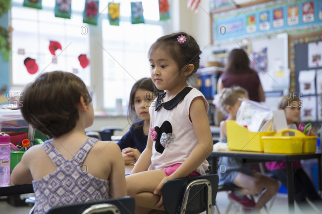 Students at table in elementary classroom