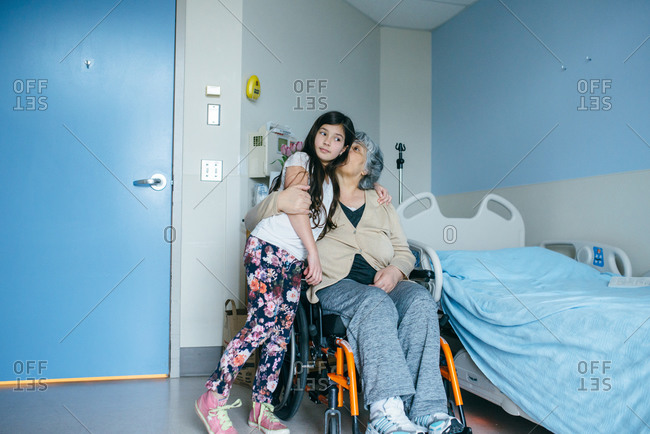 Girl and old woman in hospital