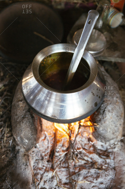 Pot cooking over a fire